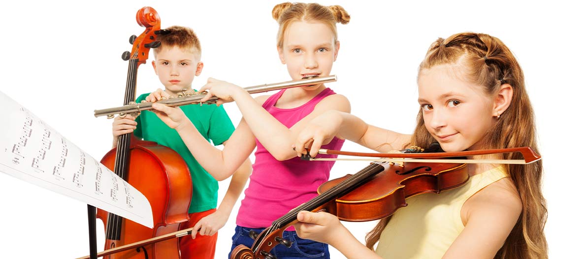 Three kids playing violin flute and cello