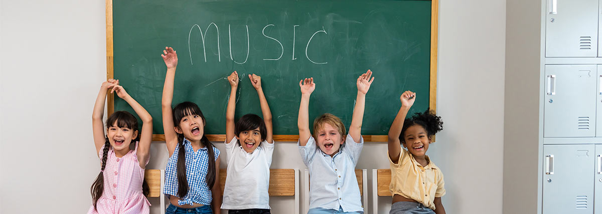 Happy kids with hands up