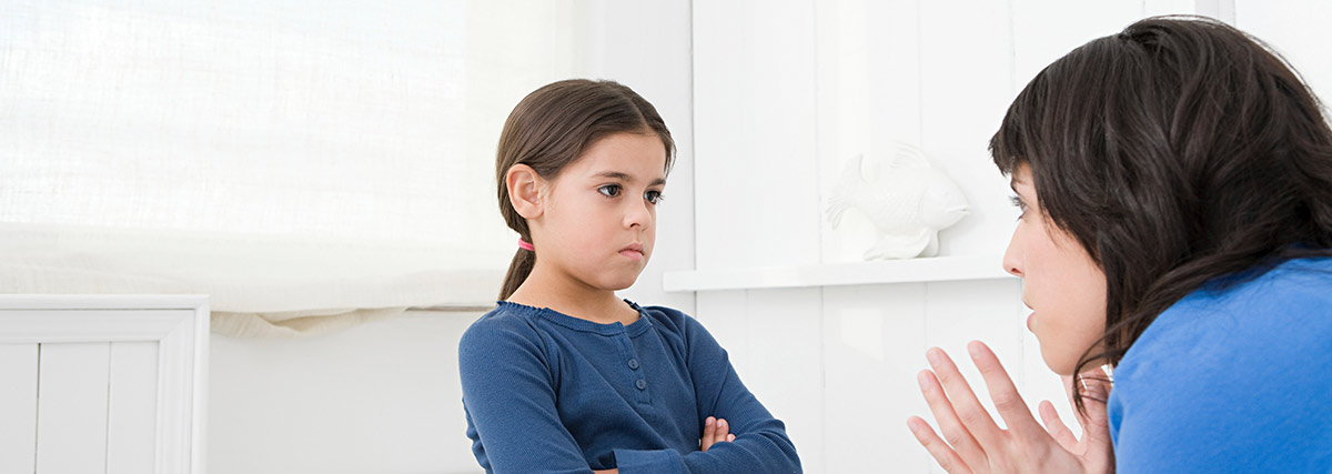 Parent calmly talking with a child